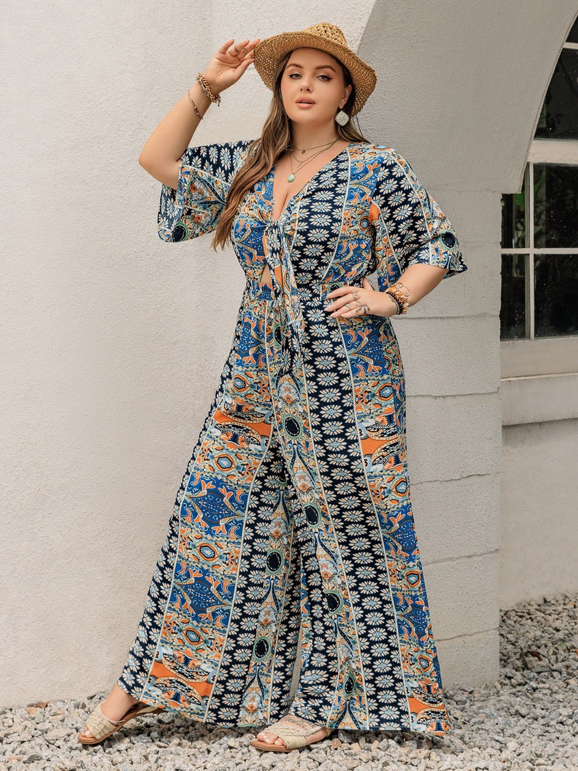 Plus Size Printed Half Sleeve Wide Leg Jumpsuit - Rochelle's House LLC