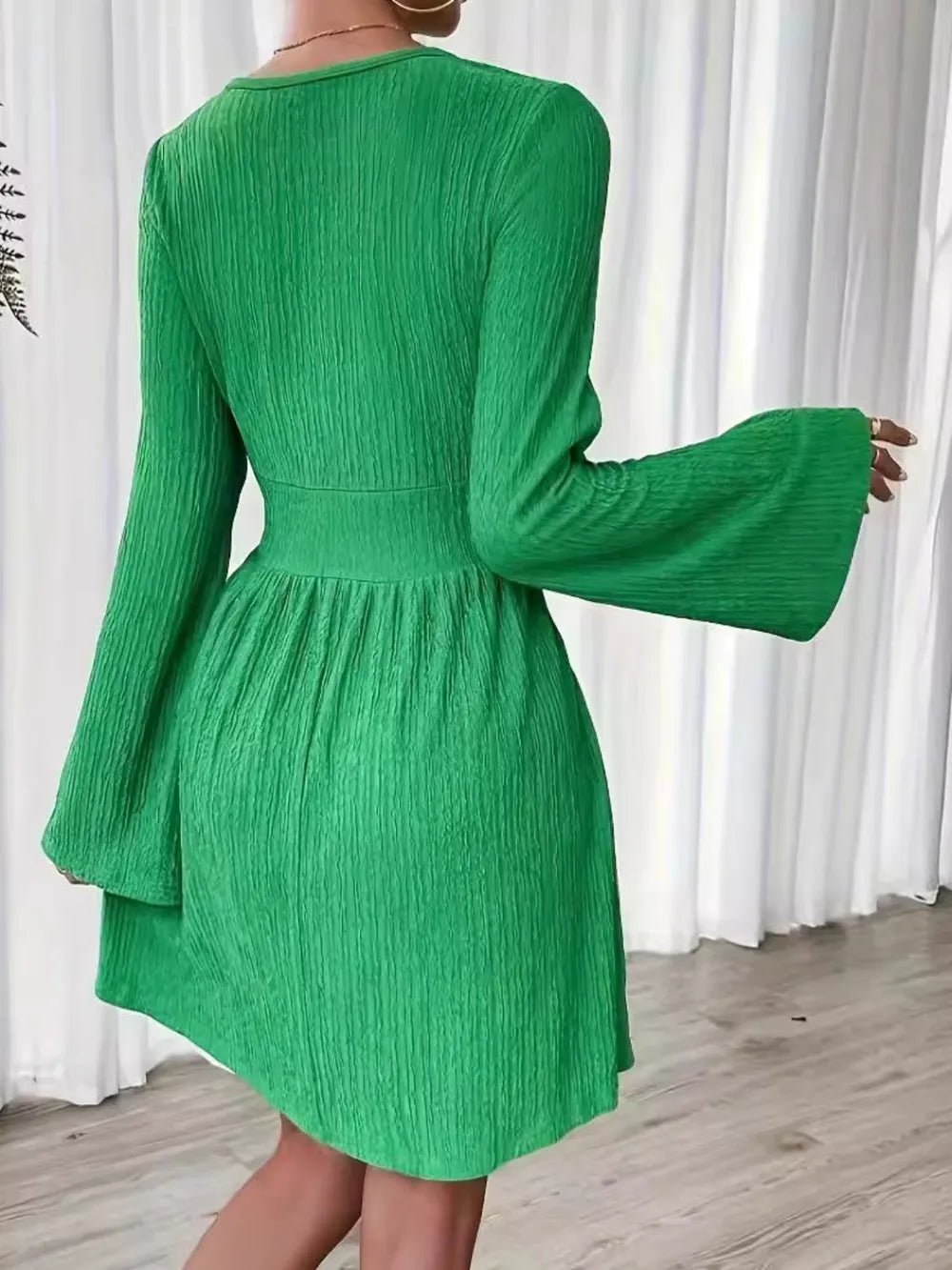 Lifestyle image of product styled for a chic daytime look, back