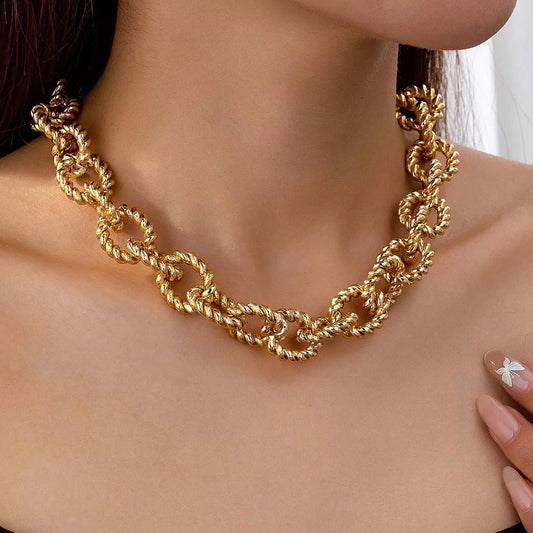 Front view of 18K Gold-Plated Alloy Twisted Necklace in Gold showing neckline and sleeve details