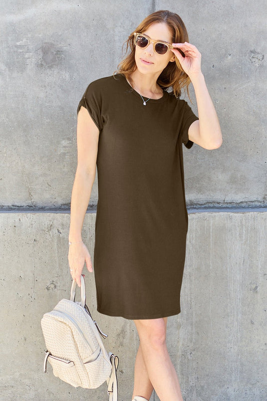 Front view of Basic Bae Full Size Round Neck Short Sleeve Dress with Pockets in Black showing neckline and sleeve details