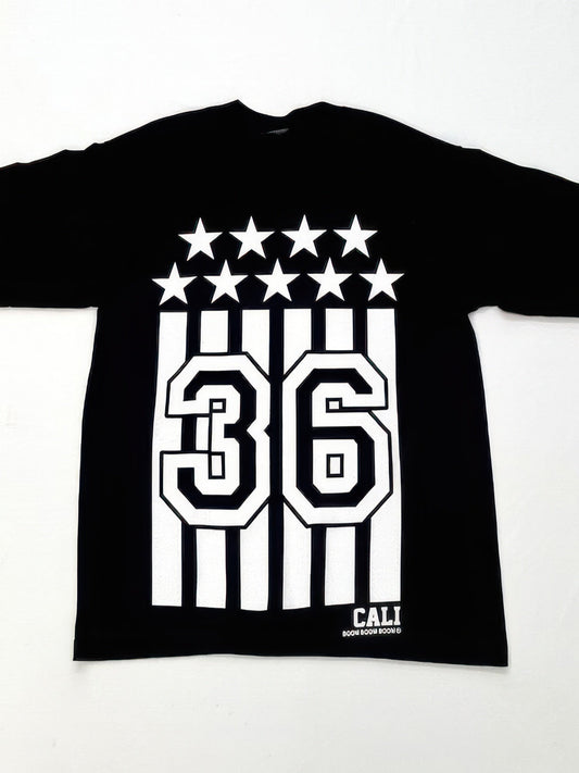Front view of Black And White Flag Print Tee in black showing neckline and sleeve details (cotton)