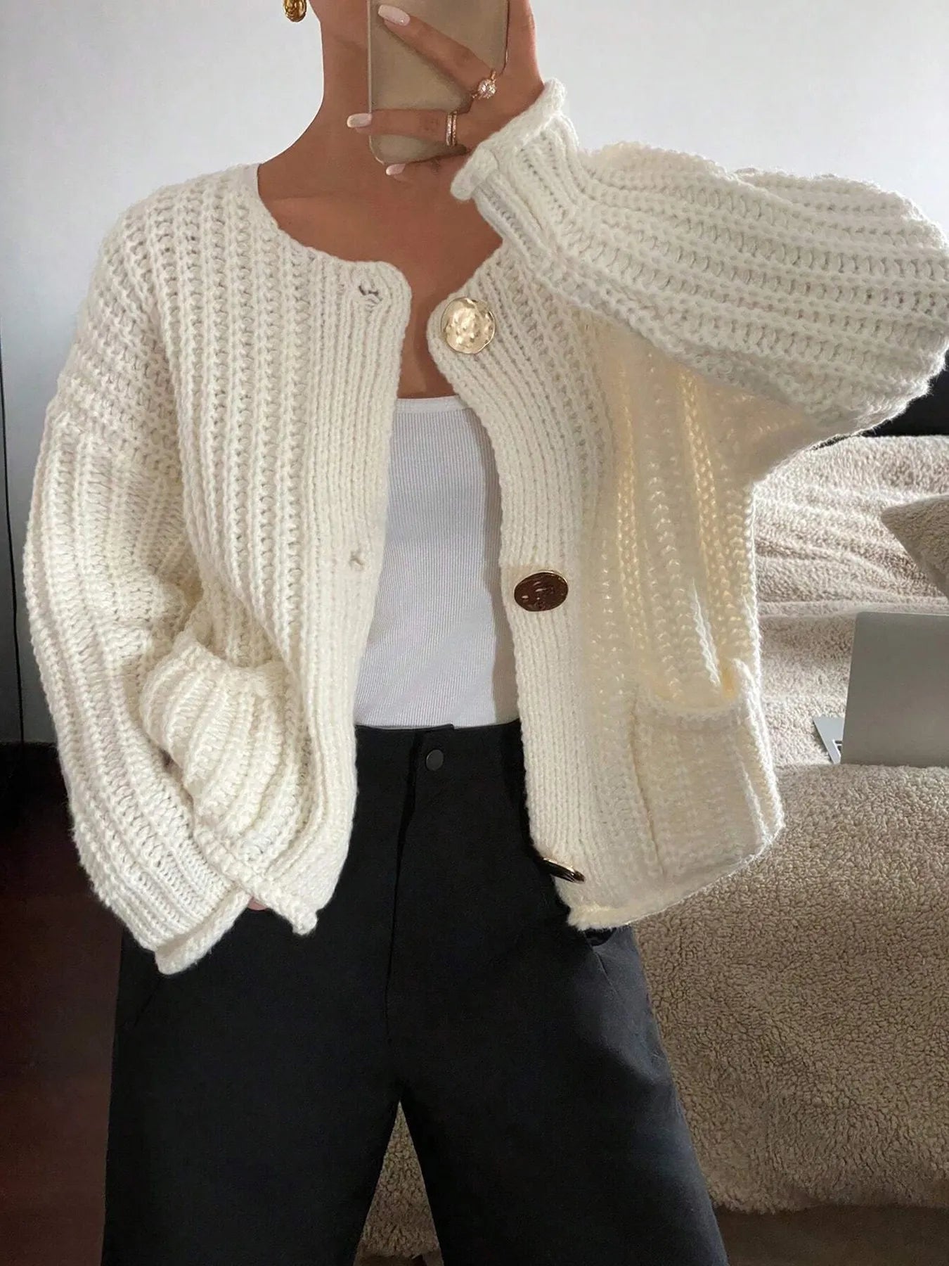 Front view of Button-Front Knit Cardigan with Pockets in Ivory showing neckline and sleeve details