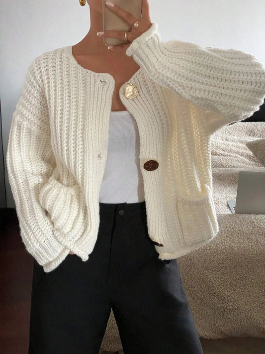 Front view of Button-Front Knit Cardigan with Pockets in Ivory showing neckline and sleeve details
