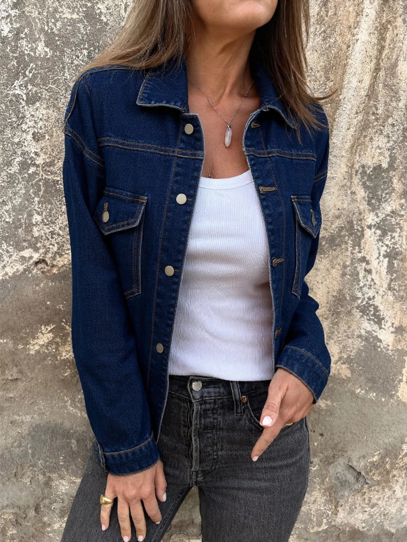 Front view of Button Up Long Sleeve Denim Jacket in Blue showing neckline and sleeve details