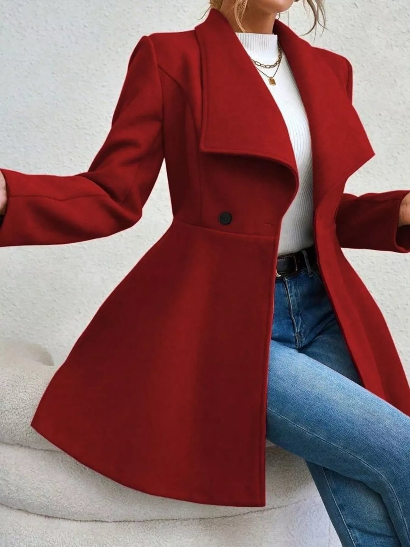 Collared neck double-breasted coat with buttons and lining — classic mid-length coat for cold-weather outfits. Red side view