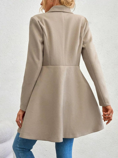 Collared neck double-breasted coat with buttons and lining — classic mid-length coat for cold-weather outfits. Back