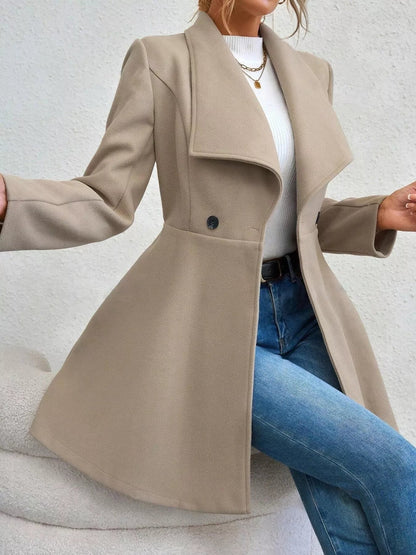 Collared neck double-breasted coat with buttons and lining — classic mid-length coat for cold-weather outfits. Apricot side view