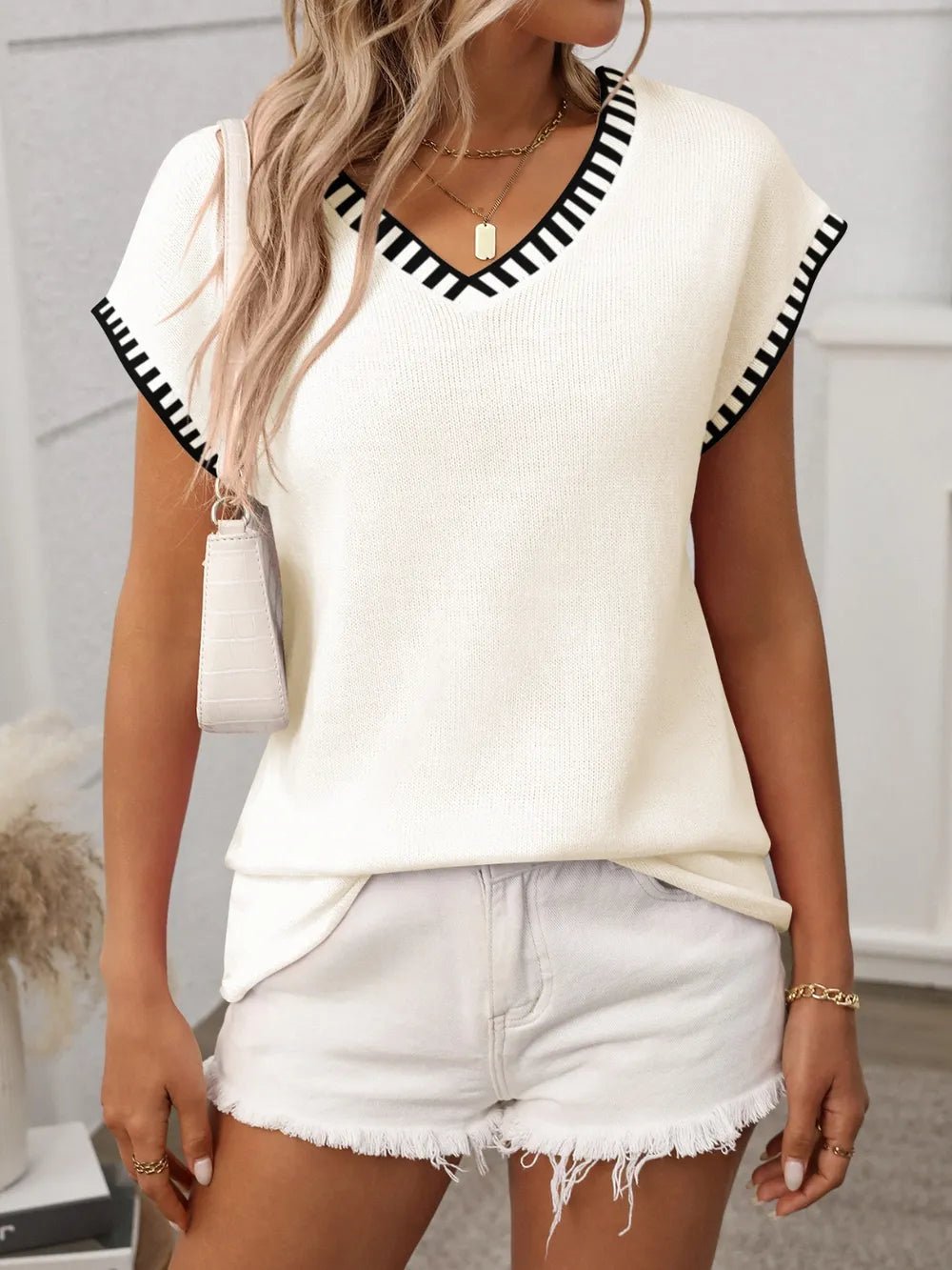 Front view of Contrast Trim V-Neck Short Sleeve Knit Top in Cream showing neckline and sleeve details