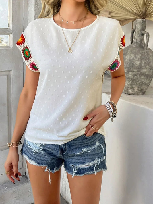 Front view of Devine Swiss Dot Round Neck Crochet Short Sleeve Top in White showing neckline and sleeve details