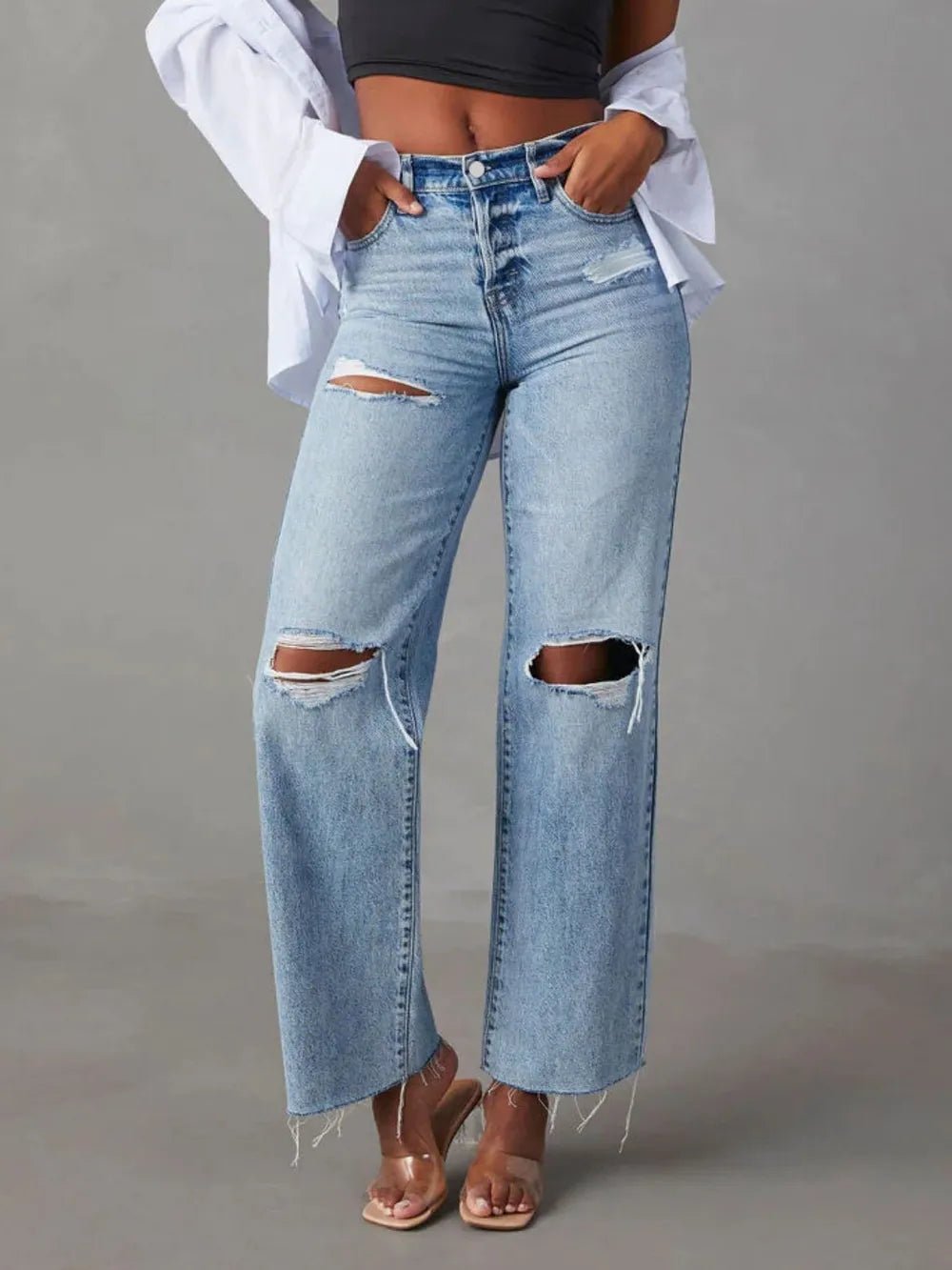 Front view of Distressed Straight Leg Jeans with Pockets in Light showing neckline and sleeve details