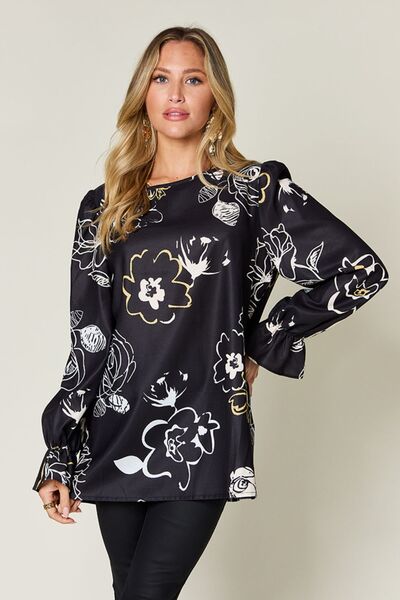 Front view of Double Take Full Size Printed Flounce Sleeve Blouse in Black showing neckline and sleeve details