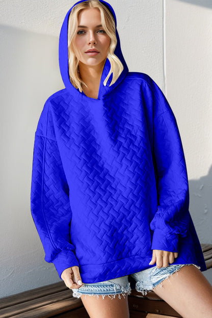 Front view of Double Take Full Size Texture Drop Shoulder Long Sleeve Hoodie in Royal Blue showing neckline and sleeve detail