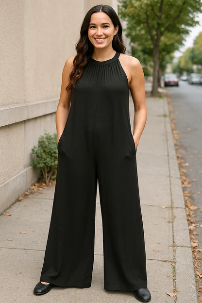 Front view of Double Take Full Size Tie Back Cutout Sleeveless Jumpsuit in Black showing neckline and sleeve details