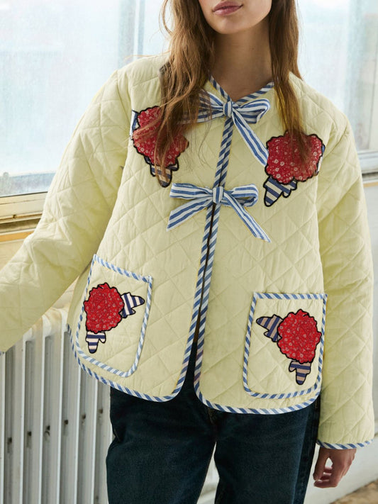 Front view of Embroidered Flower Tied Long Sleeve Winter Coat in Pastel Yellow showing neckline and sleeve details