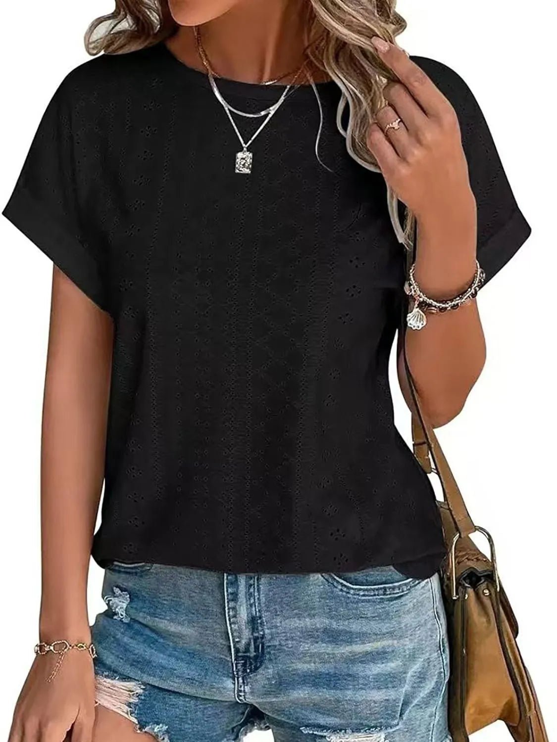 Front view of Eyelet Round Neck Short Sleeve T-Shirt in White showing neckline and sleeve details