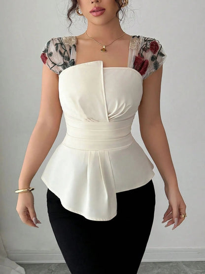 Front view of Floral Cap Sleeve Peplum Blouse in Ivory showing neckline and sleeve details (lace)