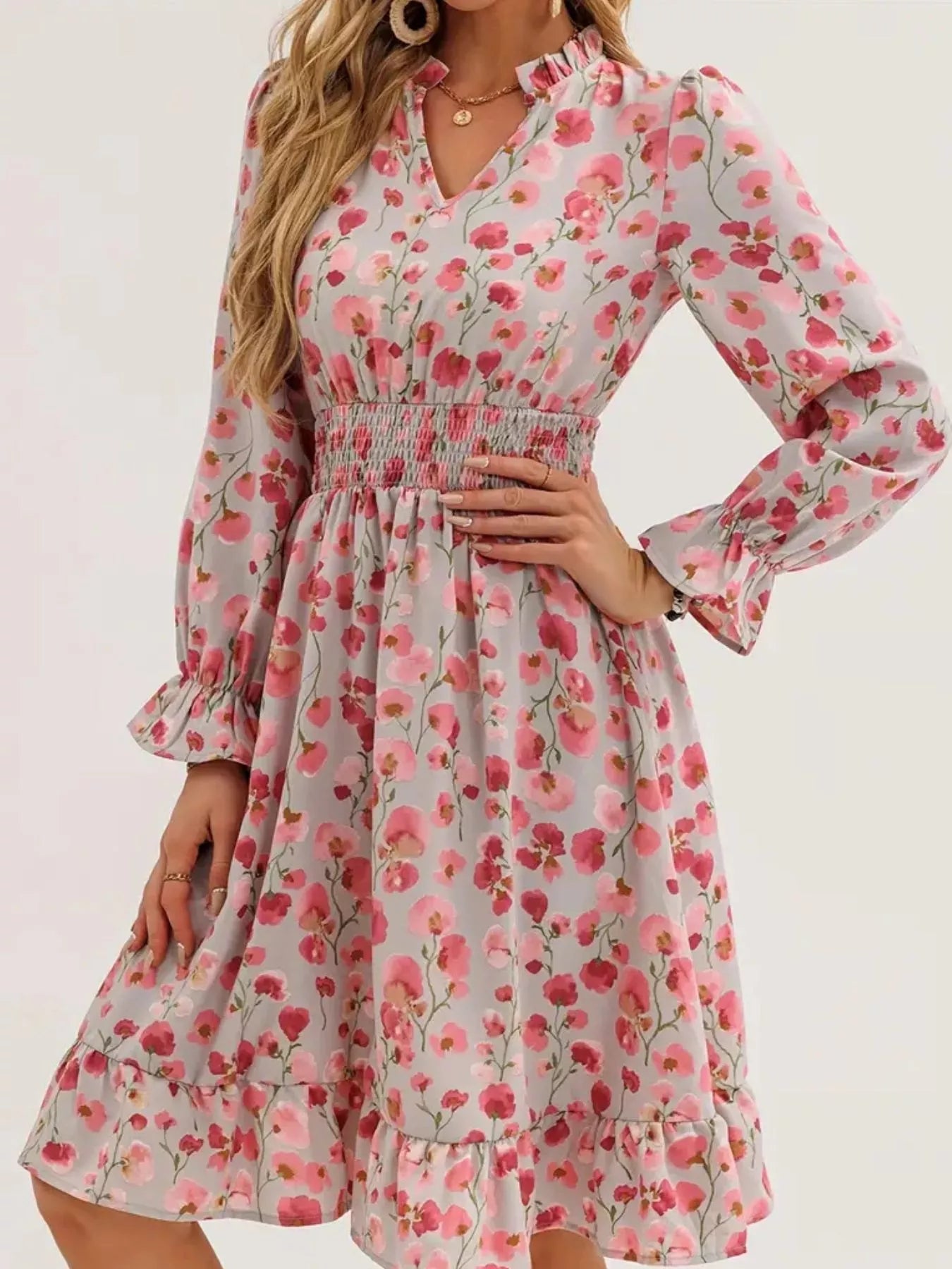 Front view of Floral Notched Flounce Sleeve Dress in Blush Pink showing neckline and sleeve details