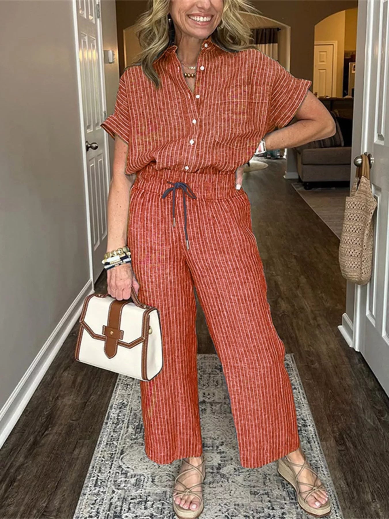 Front view of Full Size Striped Button-Up Shirt and Wide Leg Pants Casual Set Plus Size in Orange-red showing neckline and sl