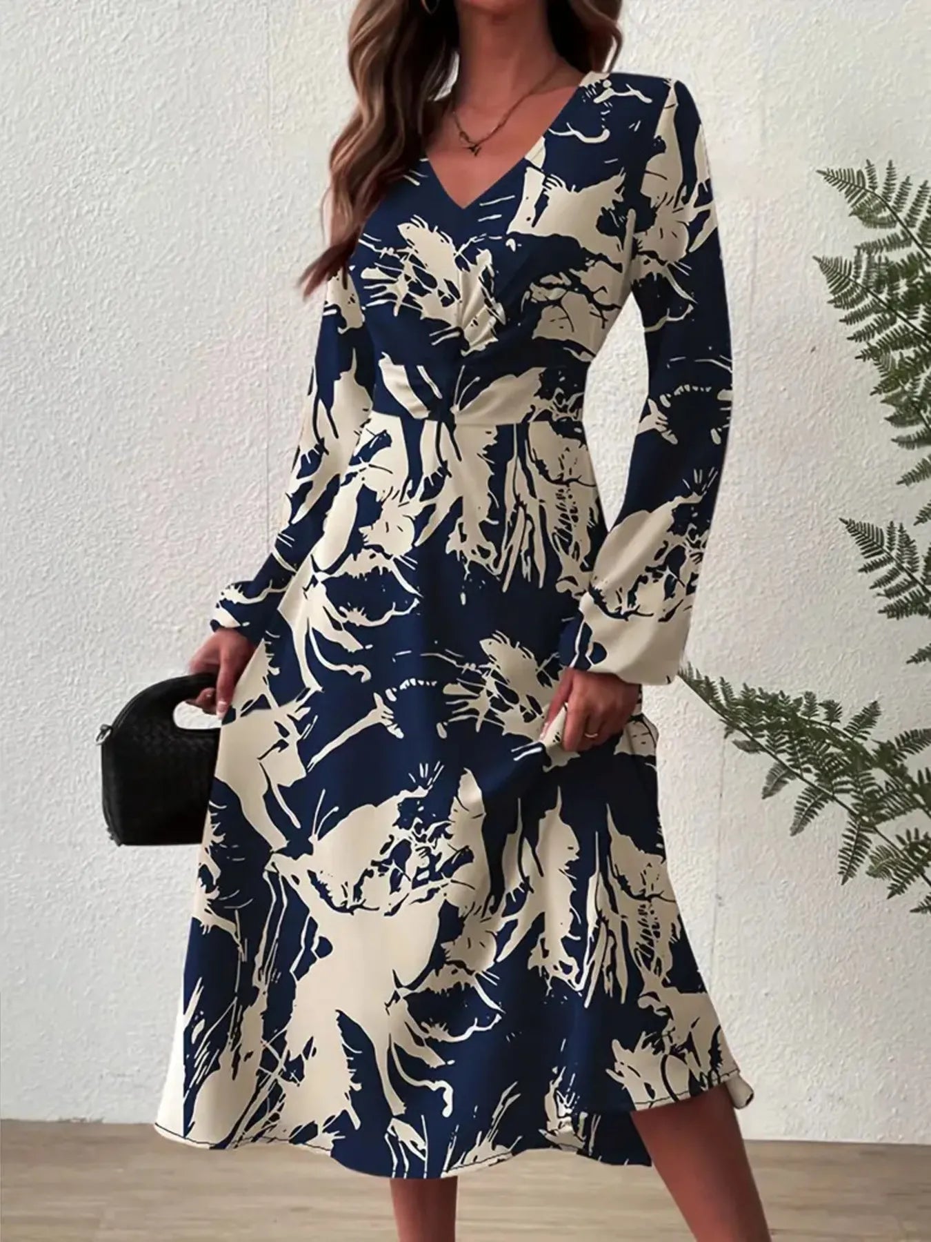 Front view of Long Sleeve Printed Midi Dress in Indigo showing neckline and sleeve details (100% polyester Care)