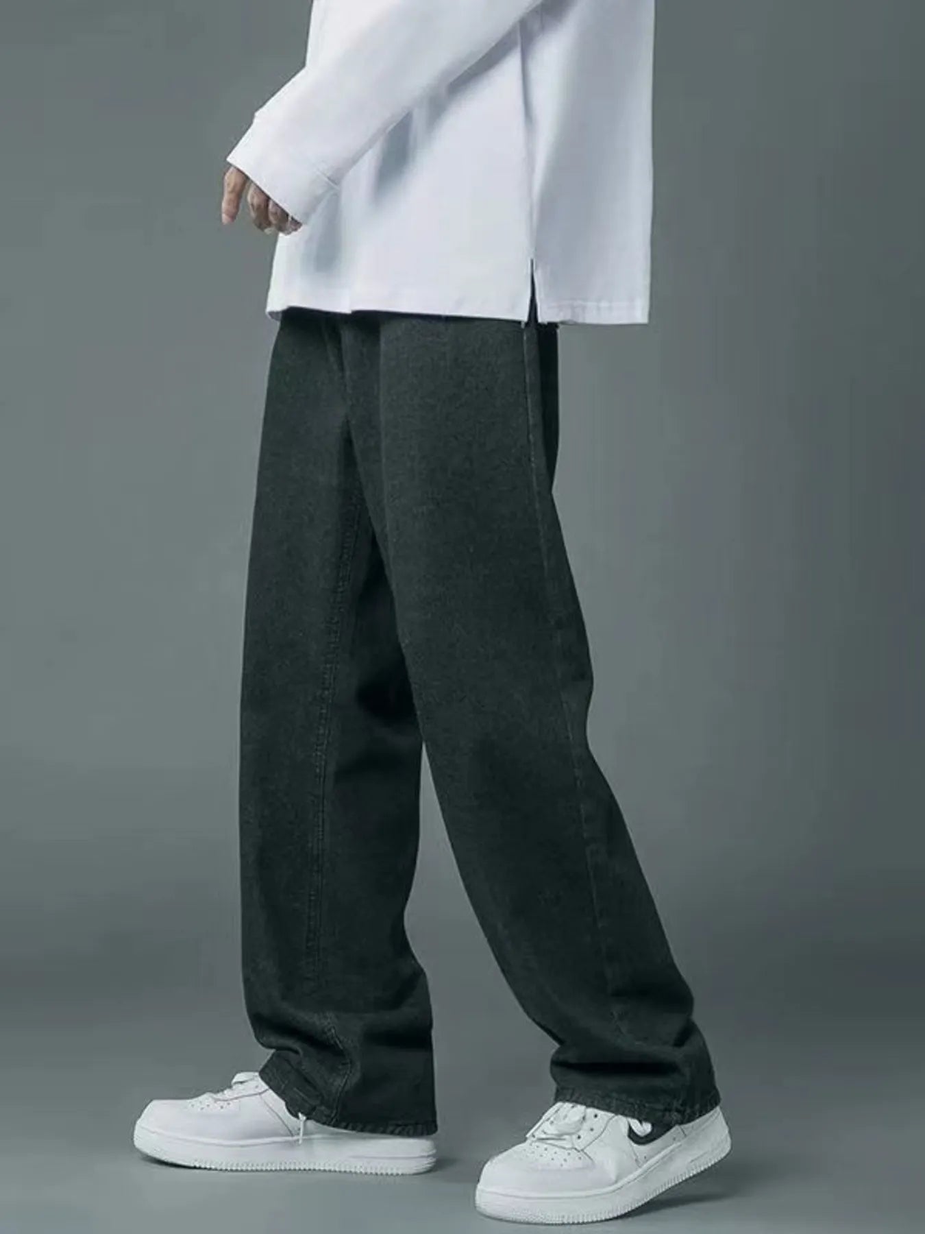 Front view of Men's Full Size Wide Leg Wash Relaxed Fit Jeans Plus Size in Black showing neckline and sleeve details