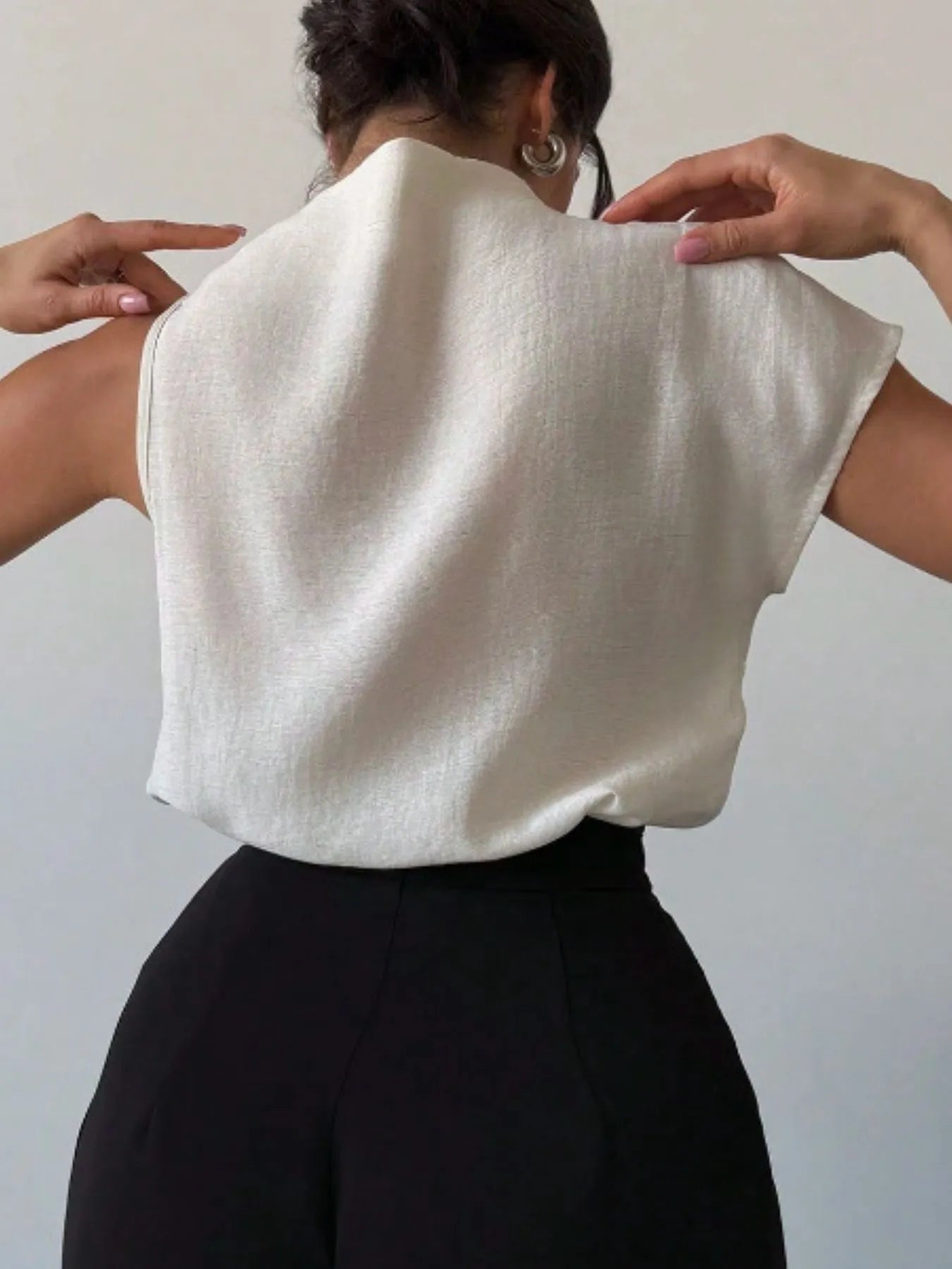 Lifestyle image of product styled for a chic daytime look