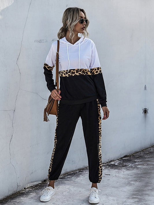 Front view of Perfee Contrast Long Sleeve Hooded Top and Joggers Set in White showing neckline and sleeve details