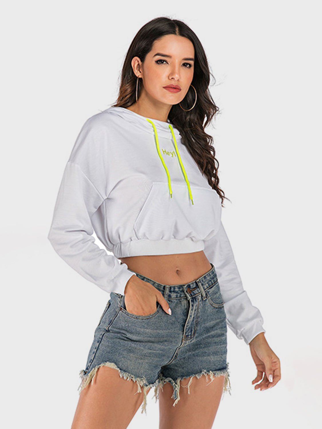 Front view of Perfee Drawstring Letter Long Sleeve Hoodie in White showing neckline and sleeve details
