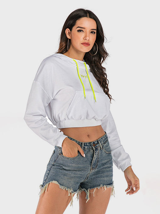 Front view of Perfee Drawstring Letter Long Sleeve Hoodie in White showing neckline and sleeve details