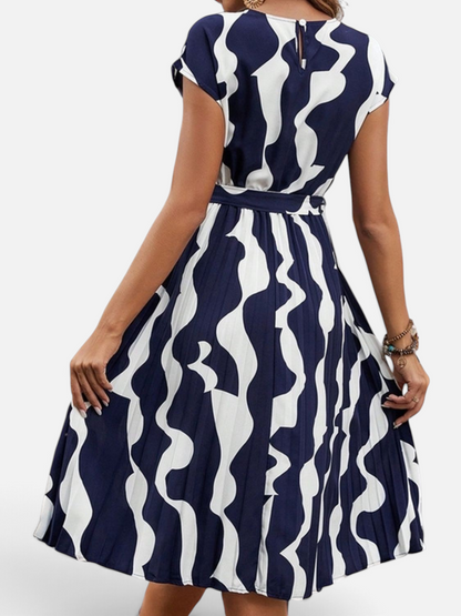 Perfee Tied Pleated Printed Cap Sleeve Dress - Rochelle's House LLC