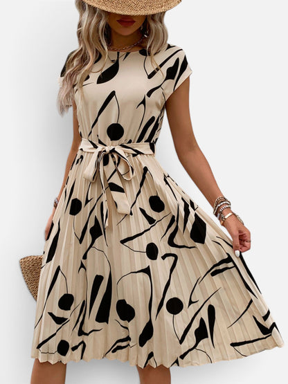 Perfee Tied Pleated Printed Cap Sleeve Dress - Rochelle's House LLC