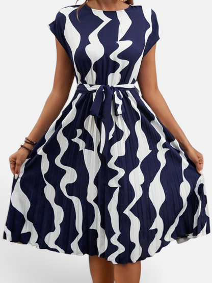 Perfee Tied Pleated Printed Cap Sleeve Dress - Rochelle's House LLC
