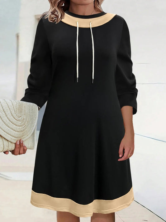 Front view of Plus Size Contrast Trim Drawstring Long Sleeve Mini Dress in Black showing neckline and sleeve details