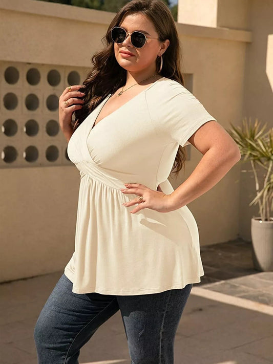 Front view of Plus Size Surplice Short Sleeve T-Shirt in Apricot showing neckline and sleeve details