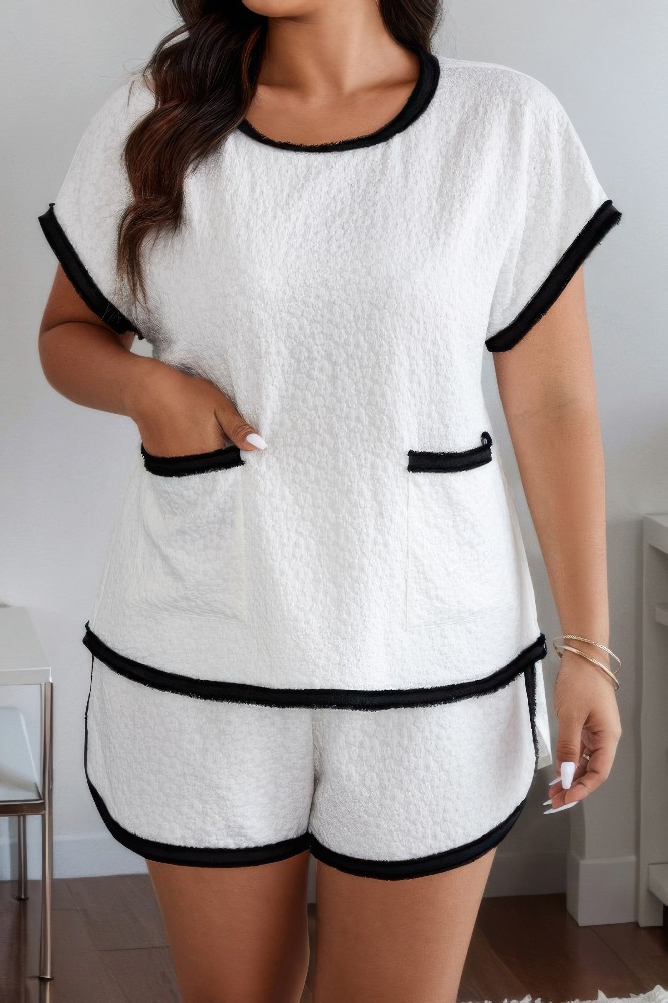 Front view of Plus Size Two Pieces Pocket Elastic Waist Sets showing neckline and sleeve details (95% polyester and)