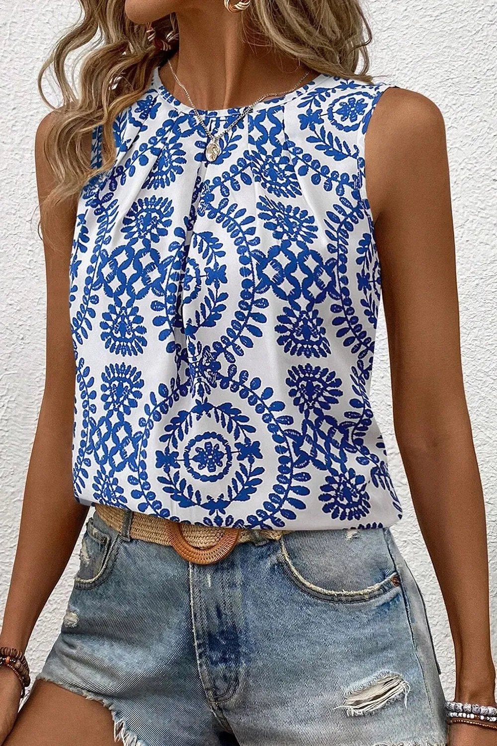 Front view of Printed Crew Neck Sleeveless Top in Blue showing neckline and sleeve details