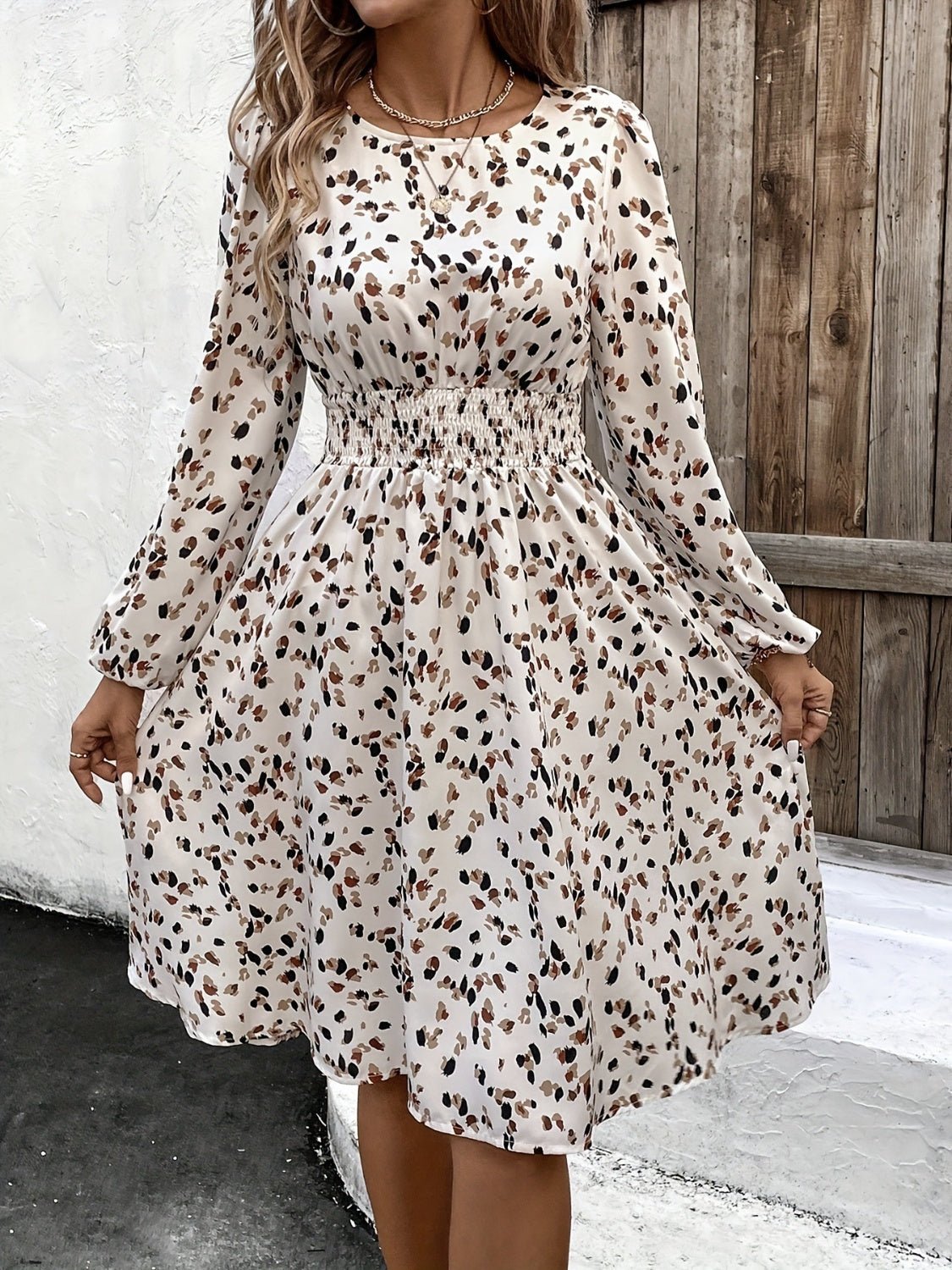 Front view of Printed Round Neck Long Sleeve Dress in Ivory showing neckline and sleeve details (100% polyester)