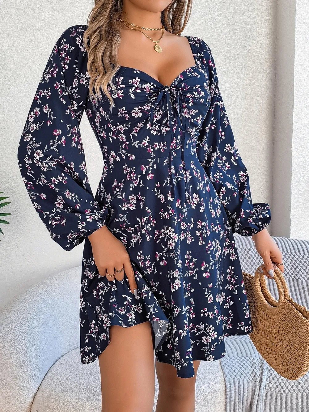 Front view of Printed Sweetheart Neck Balloon Sleeve Mini Dress in Navy showing neckline and sleeve details