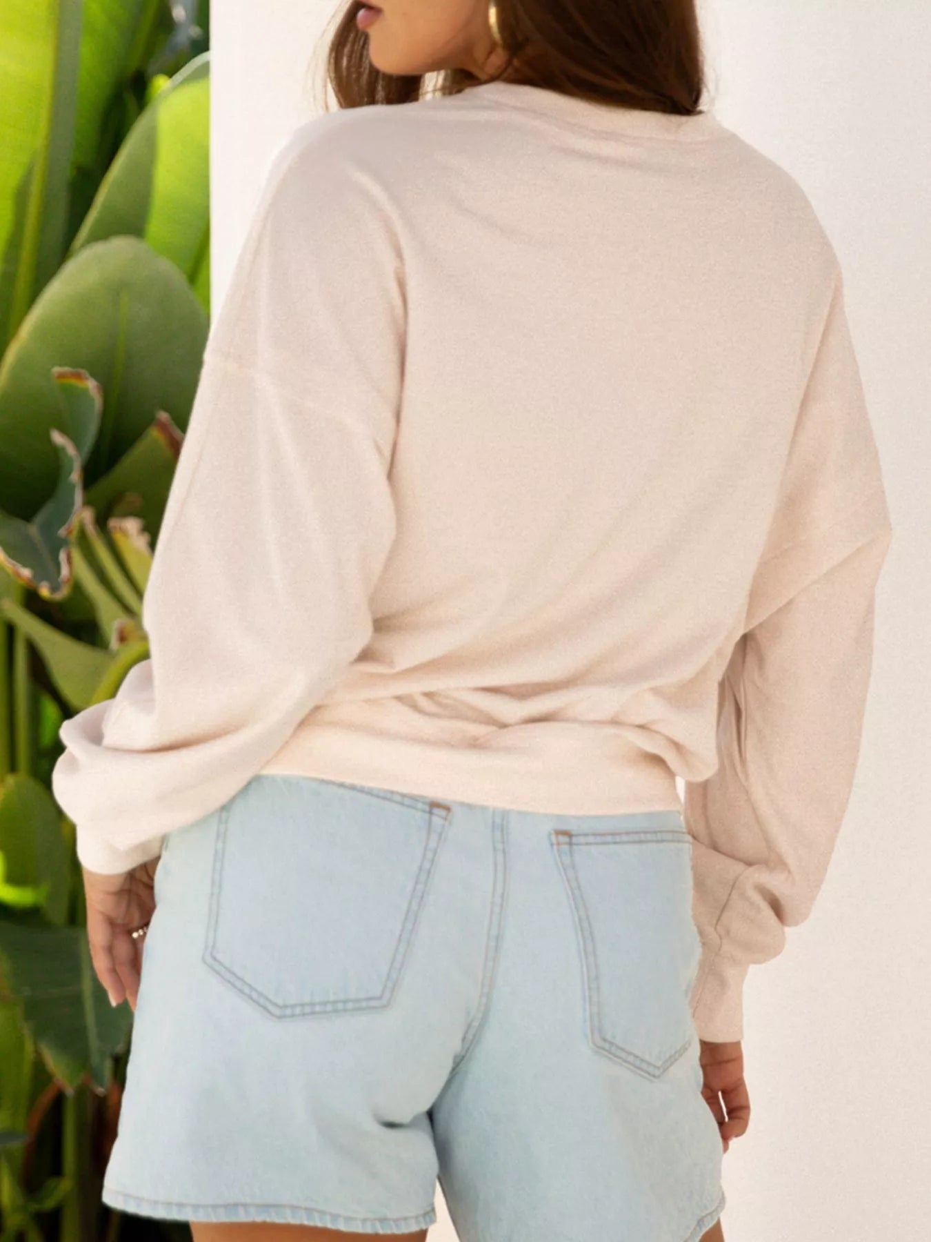 Back view of product with easy, flowy drape