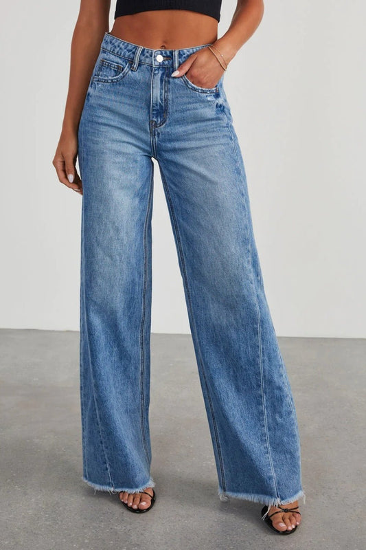 Front view of Raw Hem Wide Leg Jeans with Pockets in Medium showing neckline and sleeve details (100% cotton for durability)