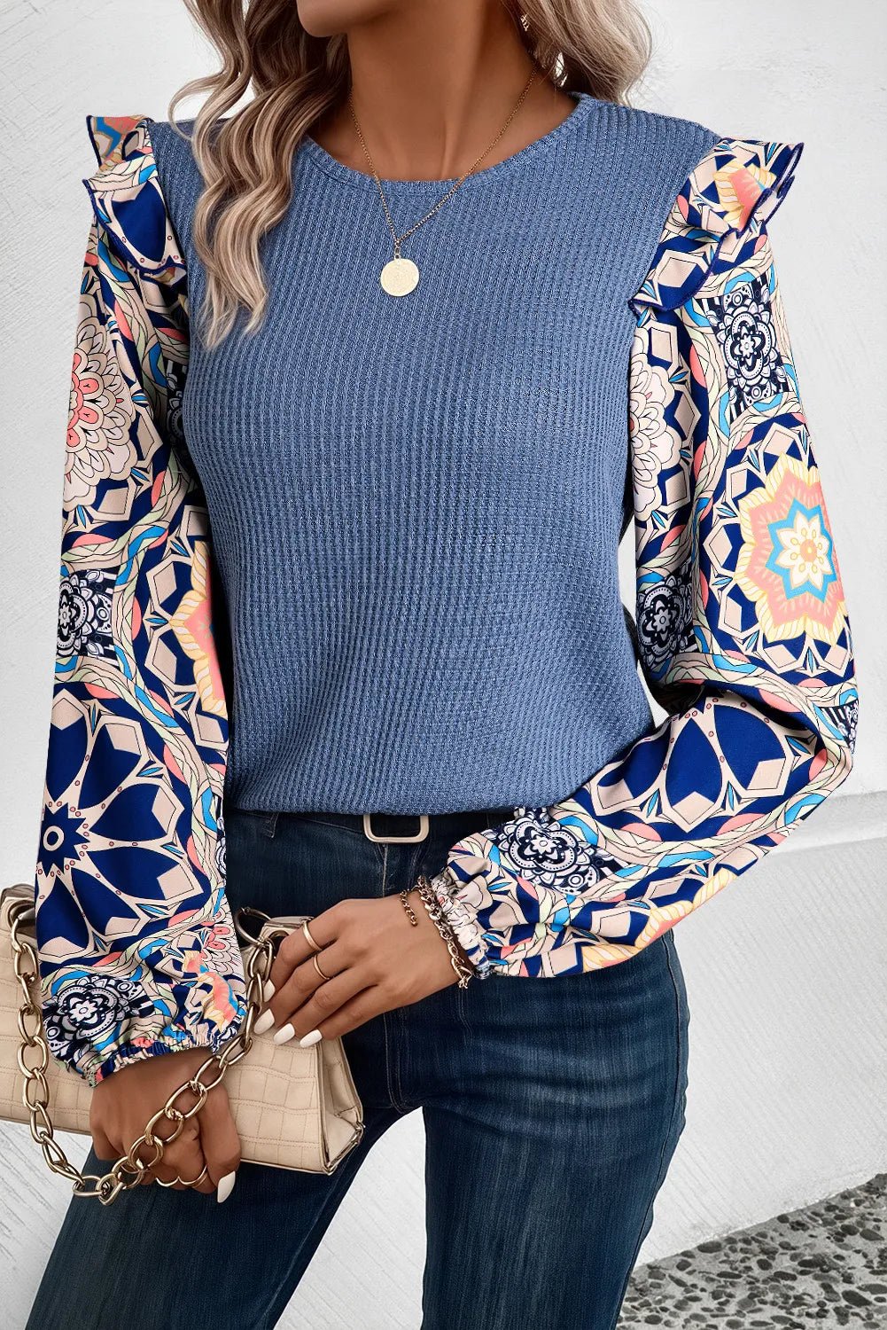 Front view of Ruffled Printed Round Neck Long Sleeve Top in Dusty Blue showing neckline and sleeve details (100% Polyester)