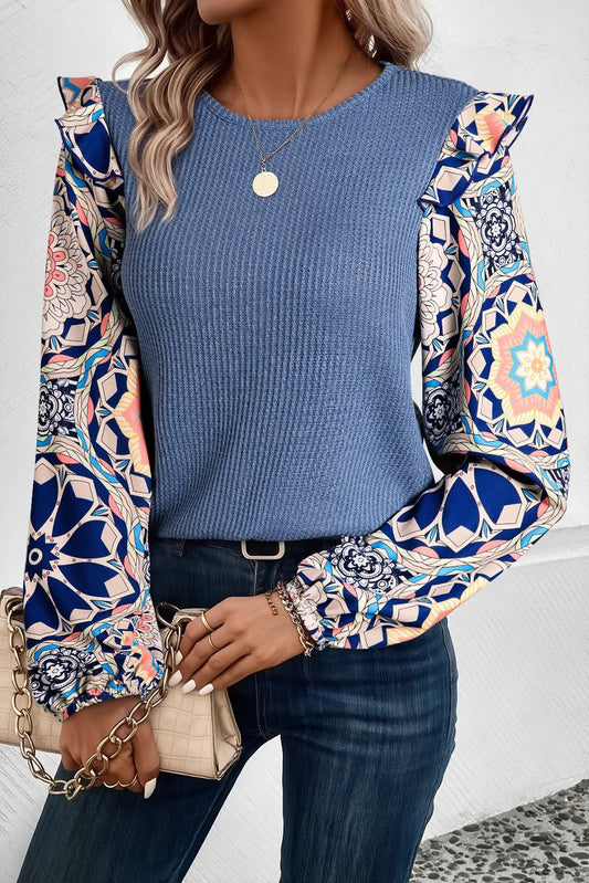 Front view of Ruffled Printed Round Neck Long Sleeve Top in Dusty Blue showing neckline and sleeve details (100% Polyester)