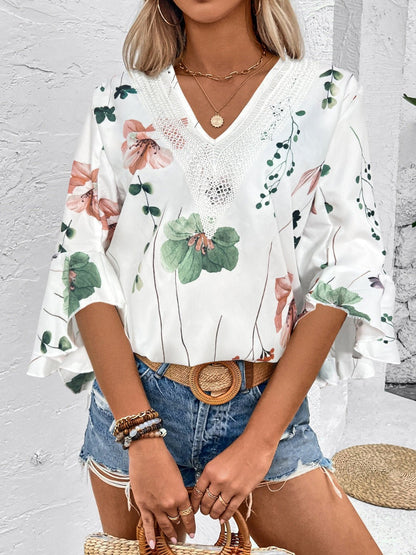 Ruffled Printed V - Neck Half Sleeve Blouse - Rochelle's House LLC