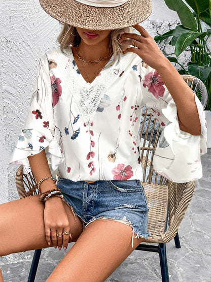 Ruffled Printed V - Neck Half Sleeve Blouse - Rochelle's House LLC