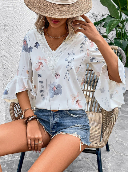 Ruffled Printed V - Neck Half Sleeve Blouse - Rochelle's House LLC