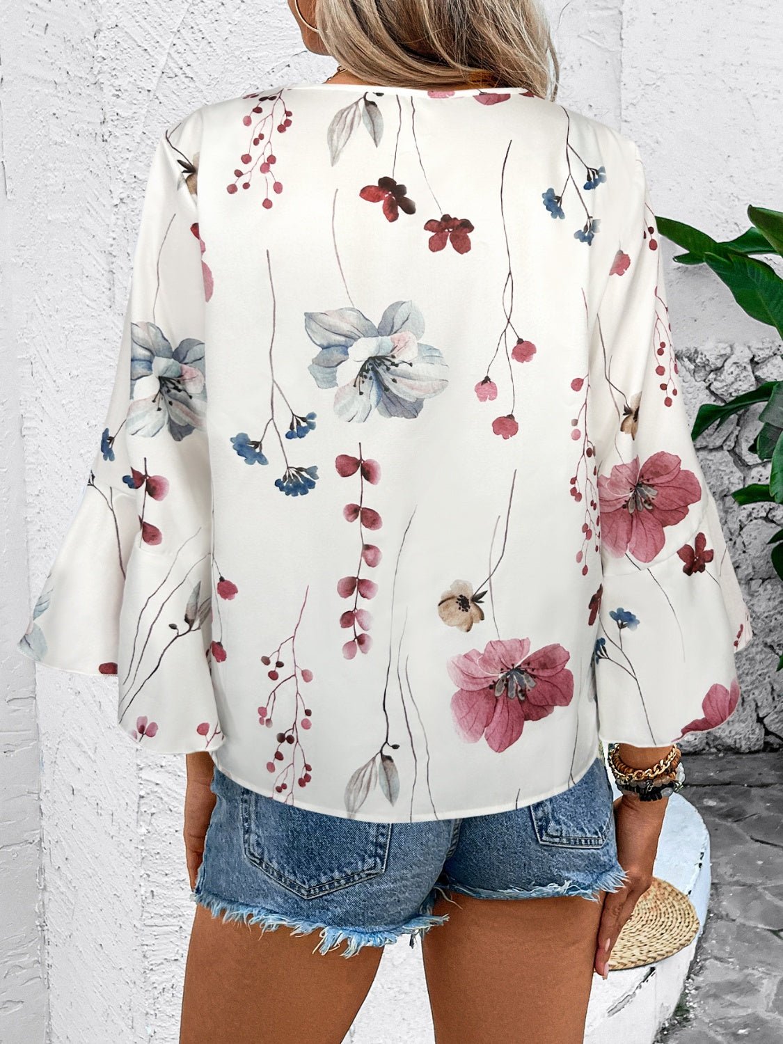 Ruffled Printed V - Neck Half Sleeve Blouse - Rochelle's House LLC