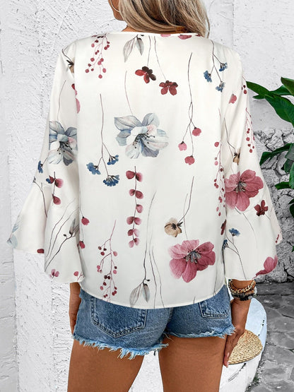 Ruffled Printed V - Neck Half Sleeve Blouse - Rochelle's House LLC