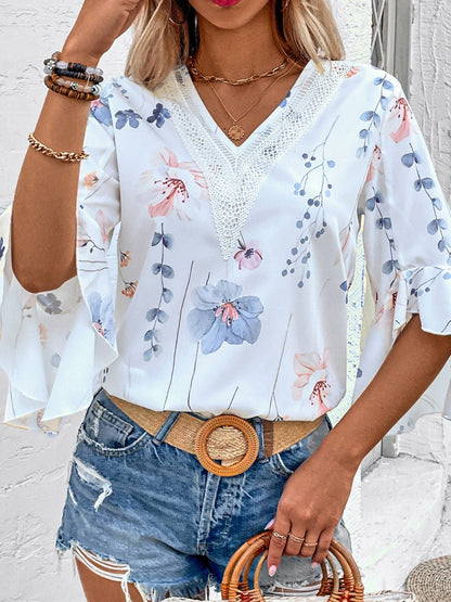 Ruffled Printed V - Neck Half Sleeve Blouse - Rochelle's House LLC