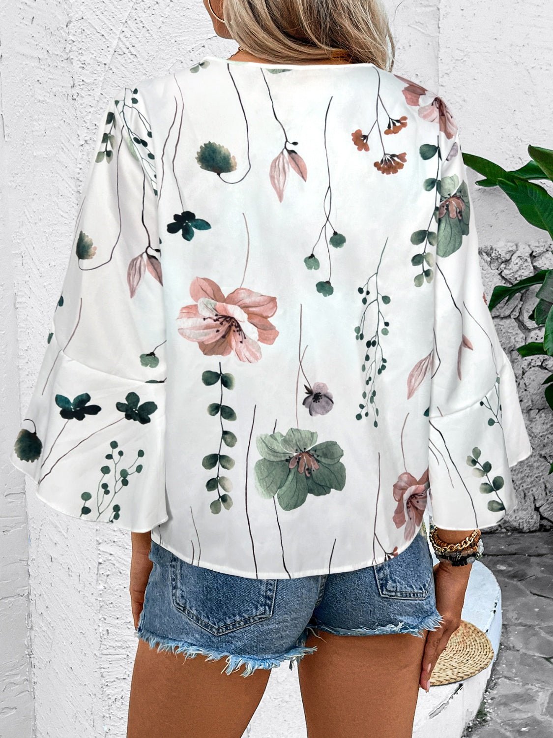 Ruffled Printed V - Neck Half Sleeve Blouse - Rochelle's House LLC