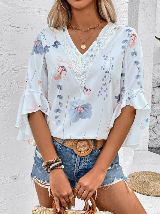 Ruffled Printed V - Neck Half Sleeve Blouse - Rochelle's House LLC