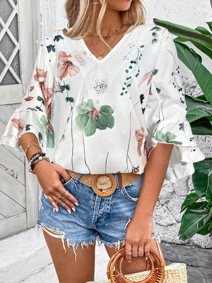 Ruffled Printed V - Neck Half Sleeve Blouse - Rochelle's House LLC